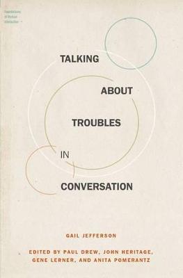 Talking About Troubles in Conversation