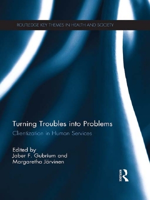 Turning Troubles into Problems: Clientization in Human Services